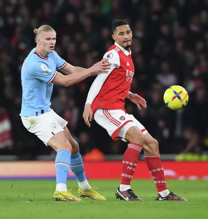 Framed Print : Saliba vs Haaland: A Star-Studded Clash in Arsenal vs Manchester City Premier League Showdown