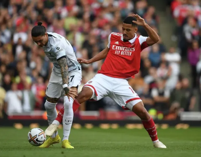 Framed Print : Saliba vs. Nunez: A Premier League Battle at Emirates Stadium