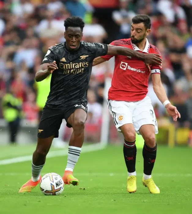 Framed Print : Sambi's Surge: Arsenal's Triumph over Manchester United as Sambi Outmaneuvers Bruno Fernandes in the 2022-23 Premier League