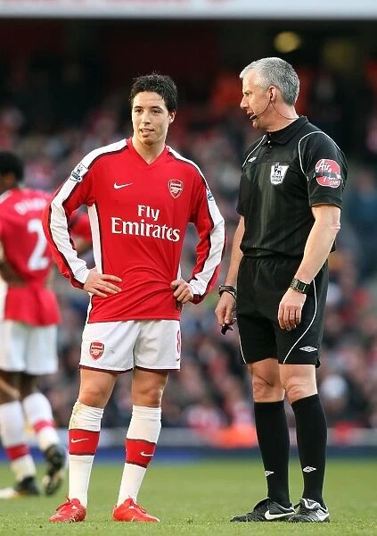 Samir Nasri (Arsenal) chats to Referee Chris Foy. Arsenal 3: 1 Burnley. Barclays Premier League