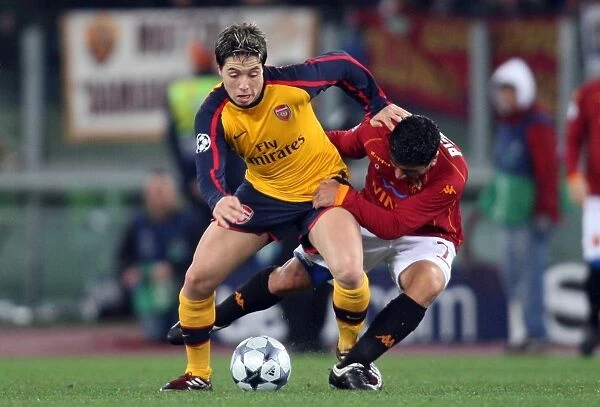 Samir Nasri (Arsenal) David Pizarro (Roma)
