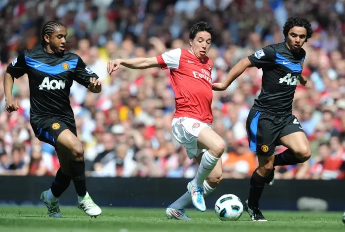 Framed Print : Samir Nasri (Arsenal) Fabio and Anderson (Man United). Arsenal 1: 0 Manchester United Framed Print : Samir Nasri (Arsenal) Fabio and Anderson (Man United). Arsenal 1: 0 Manchester United