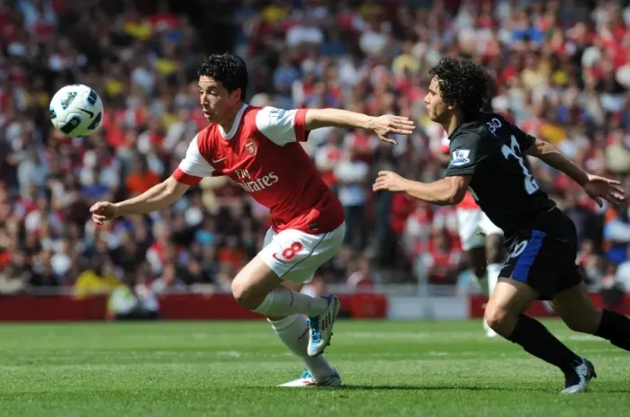 Framed Print : Samir Nasri (Arsenal) Fabio (Man Utd). Arsenal 1: 0 Manchester United. Barclays Premier League