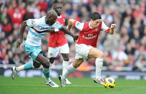Samir Nasri (Arsenal) Herita Ilunga (West Ham). Arsenal 1: 0 West Ham United
