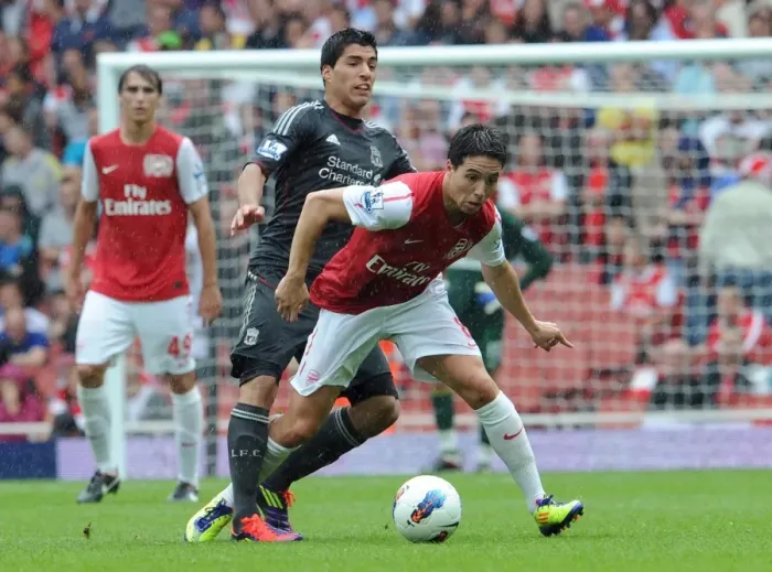 Framed Print : Samir Nasri (Arsenal) Luis Suarez (Liverpool). Arsenal 0: 2 Liverpool. Barclays Premier League