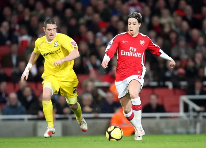 Framed Print : Samir Nasri (Arsenal) Mark Kennedy (Cardiff) Framed Print : Samir Nasri (Arsenal) Mark Kennedy (Cardiff)