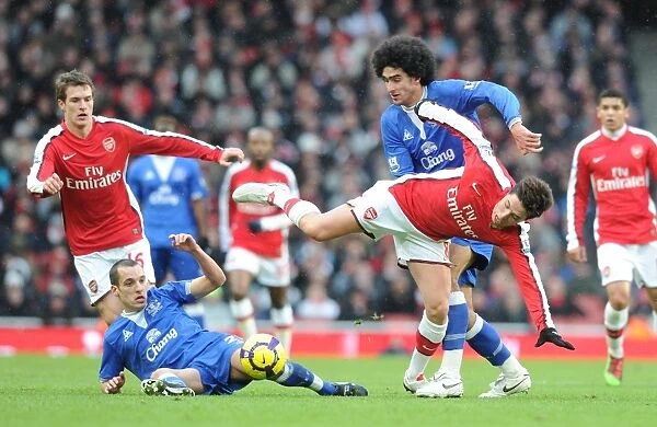 Samir Nasri (Arsenal) Marouane Fellaini and Leon Osman (Everton). Arsenal 2: 2 Everton