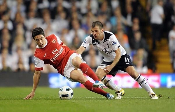 Samir Nasri (Arsenal) Rafeal van der Vaart (Tottenham). Tottenham Hotspur 3:3 Arsenal