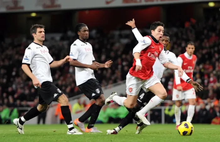 Framed Print : Samir Nasri beats Aaron Hughes, Dickson Etuhu and John Pantsil (Fulham) on his way to scoring his Framed Print : Samir Nasri beats Aaron Hughes, Dickson Etuhu and John Pantsil (Fulham) on his way to scoring his