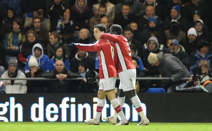Framed Print : Samir Nasri celebrates scoring the 2nd Arsenal goal with Bacary Sagna. Portsmouth 1