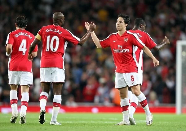 Samir Nasri celebrates scoring Arsenals 1st goal with William Gallas