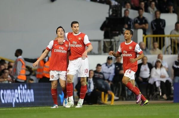 Samir Nasri celebrates scoring Arsenals 2nd goal with Theo Walcott