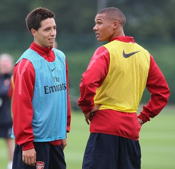 Samir Nasri and Kieran Gibbs (Arsenal). Arsenal Training Session. Arsenal Training Ground
