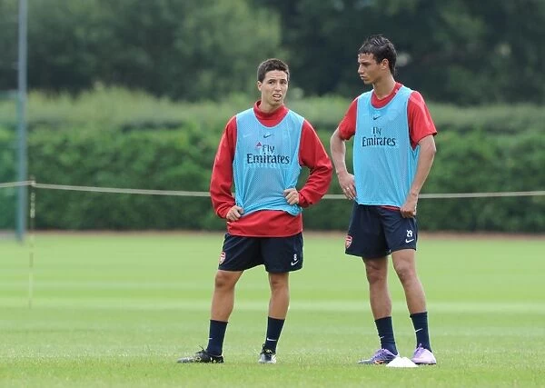 Samir Nasri and Marouane Chamakh (Arsenal). Arsenal Training Ground, London Colney