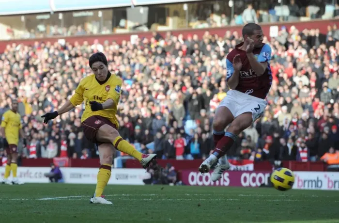 Framed Print : Samir Nasri scores Arsenals 2nd goal under pressure from Luke Young (Villa)