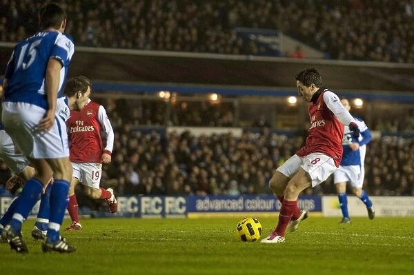 Samir Nasri shoots past Birmingham goalkeeper Ben Foster to score the 2nd Arsenal goal