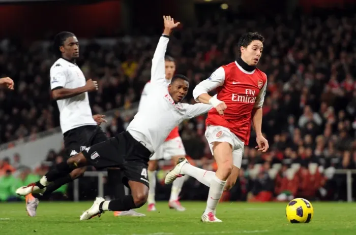 Framed Print : Samir Nasri's Thrilling Goal: Beating Etuhu and Pantsil for Arsenal's 2-1 Lead Against Fulham Framed Print : Samir Nasri's Thrilling Goal: Beating Etuhu and Pantsil for Arsenal's 2-1 Lead Against Fulham