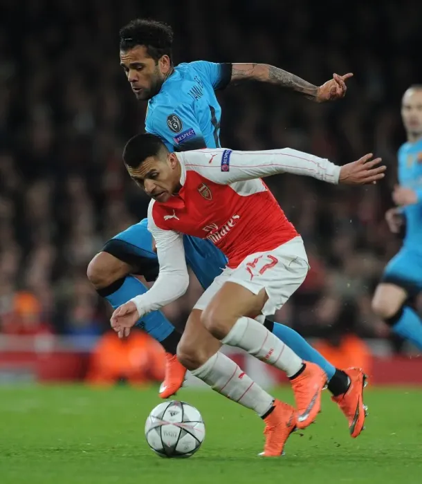 Framed Print : Sanchez vs. Alves: A Champions League Showdown - Arsenal's Battle with Barcelona (2015 / 16)