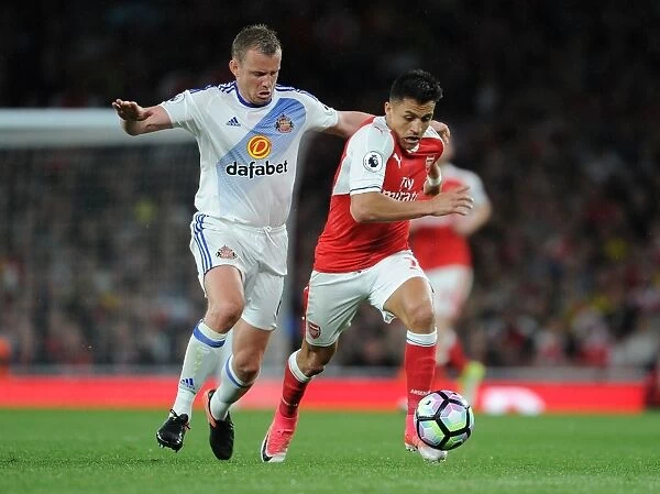 Sanchez vs. Cattermole: A Fierce Rivalry - Arsenal's Determined Battle Against Sunderland