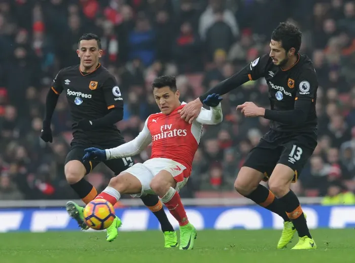 Framed Print : Sanchez vs. Hull Defenders: A Football Battle at the Emirates Framed Print : Sanchez vs. Hull Defenders: A Football Battle at the Emirates