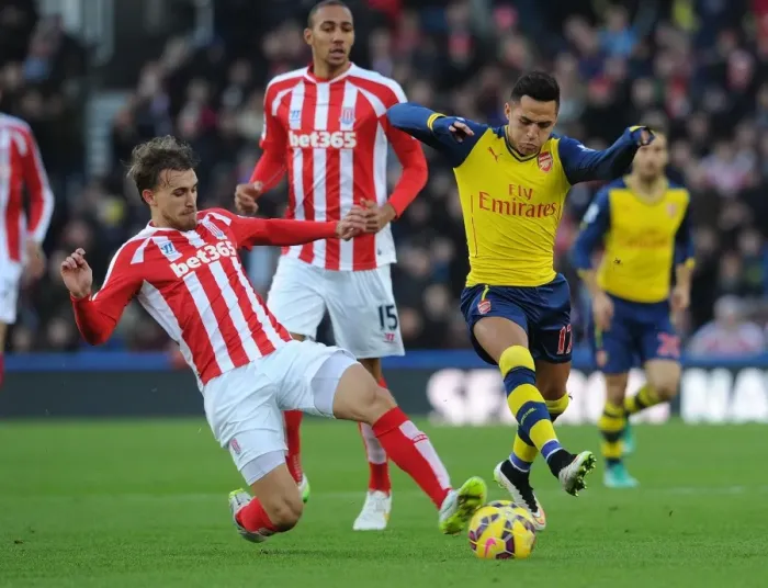 Framed Print : Sanchez vs Muniesa: A Premier League Clash at Britannia