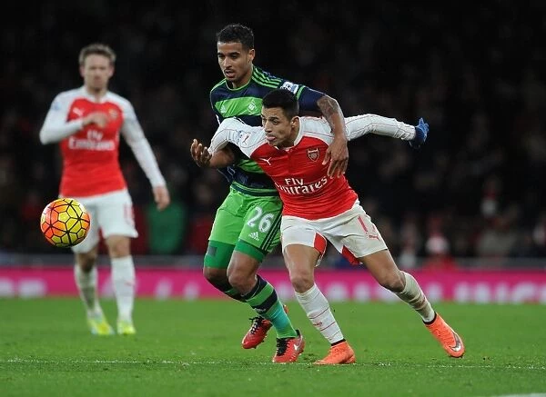 Sanchez vs. Naughton: Intense Clash in Arsenal's Victory over Swansea City