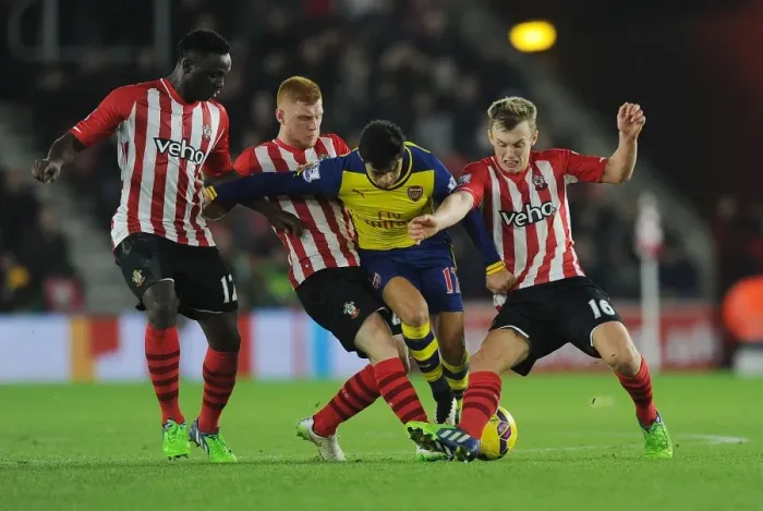 Framed Print : Sanchez vs. Southampton Trio: A Intense Battle at St. Mary's