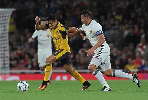Sanchez vs. Suchy: A Champions League Showdown - Intense Face-Off Between Arsenal's Sanchez and Basel's Defender