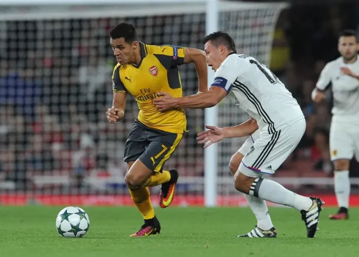 Framed Print : Sanchez vs. Suchy: Intense Face-Off Between Arsenal's Sanchez and Basel's Defender in Champions League Match Framed Print : Sanchez vs. Suchy: Intense Face-Off Between Arsenal's Sanchez and Basel's Defender in Champions League Match