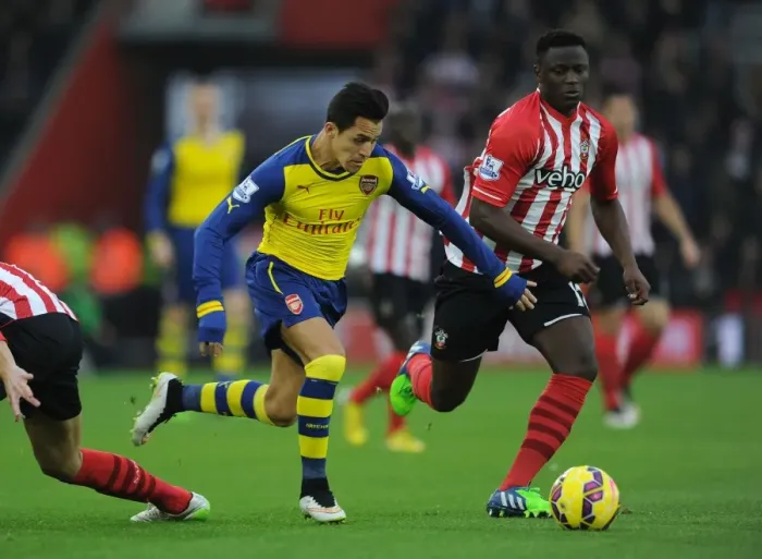 Framed Print : Sanchez vs. Wanyama: A Premier League Battle at St. Mary's - Arsenal vs. Southampton, 2014-15