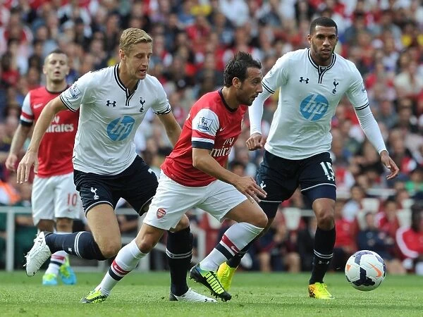 Santi Cazorla (Arsenal) Michael Dawson and Etienne Capoue (Tottenham). Arsenal 1