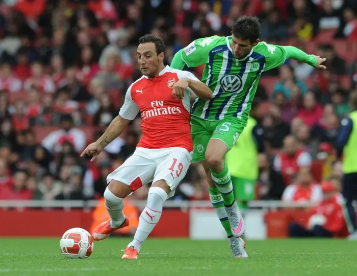 Framed Print : Santi Cazorla: Arsenal's Midfield Maestro Feels the Heat Against VfL Wolfsburg at Emirates Cup, 2015 Framed Print : Santi Cazorla: Arsenal's Midfield Maestro Feels the Heat Against VfL Wolfsburg at Emirates Cup, 2015
