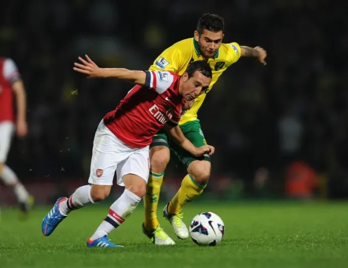 Framed Print : Santi Cazorla Dashes Past Bradley Johnson: Norwich City vs Arsenal, Premier League 2012-13