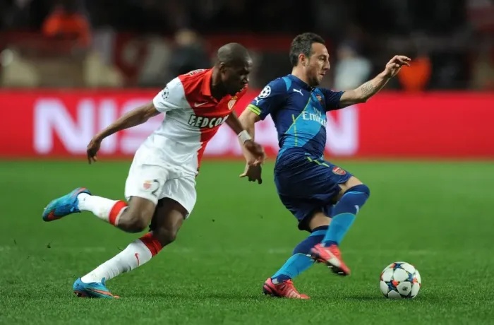 Framed Print : Santi Cazorla Dashes Past Geoffrey Kondogbia: Monaco vs. Arsenal, UEFA Champions League Round of 16, 2015