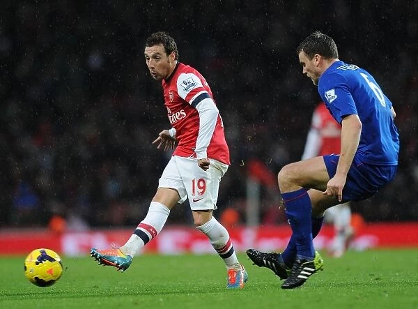 Santi Cazorla Drives Past Ben Turner: Arsenal vs. Cardiff City, Premier League