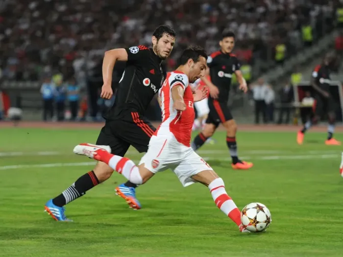 Framed Print : Santi Cazorla Faces Off Against Pedro Franco: Tense Moment from Arsenal's UEFA Champions League Clash with Besiktas Framed Print : Santi Cazorla Faces Off Against Pedro Franco: Tense Moment from Arsenal's UEFA Champions League Clash with Besiktas