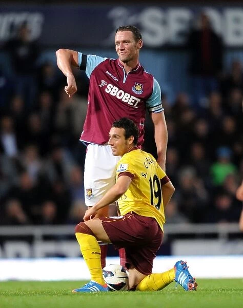 Santi Cazorla and Kevin Nolan Clash: A Moment of Controversy in West Ham United vs. Arsenal (2012-13)