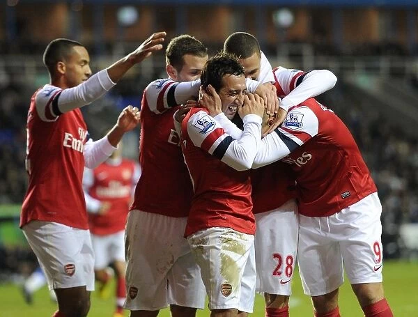 Santi Cazorla and Lukas Podolski Celebrate Goals: Reading vs. Arsenal, 2012-13 Premier League