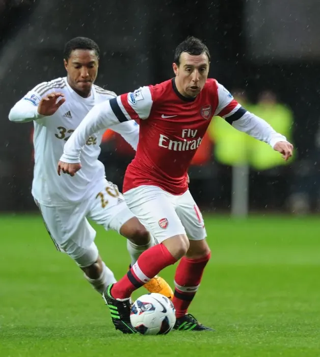 Framed Print : Santi Cazorla Outmaneuvers Jonathan de Guzman: Swansea City vs Arsenal, Premier League 2012-13