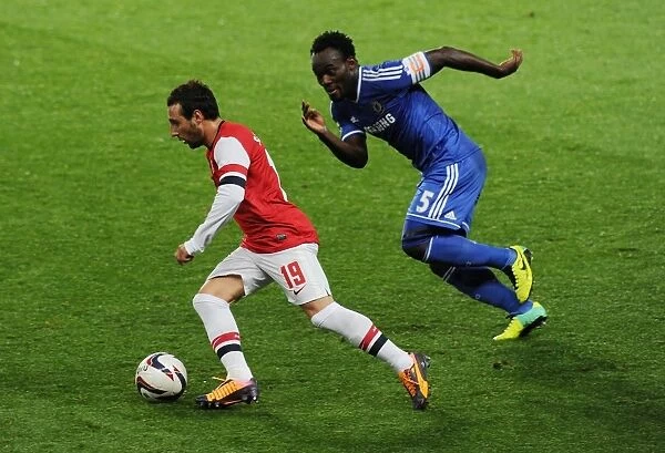 Santi Cazorla Outmaneuvers Michael Essien: Arsenal vs. Chelsea, Capital One Cup 2013-14