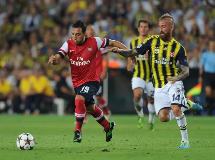 Framed Print : Santi Cazorla Outmaneuvers Raul Meireles: Arsenal vs. Fenerbahce, UEFA Champions League Play-offs (2013) Framed Print : Santi Cazorla Outmaneuvers Raul Meireles: Arsenal vs. Fenerbahce, UEFA Champions League Play-offs (2013)
