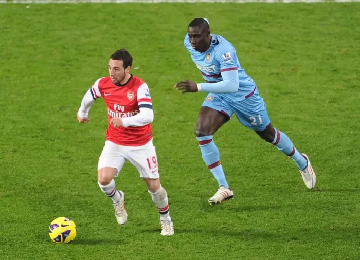 Framed Print : Santi Cazorla Outruns Mohamed Diarra: Arsenal vs. West Ham United, Premier League 2012-13