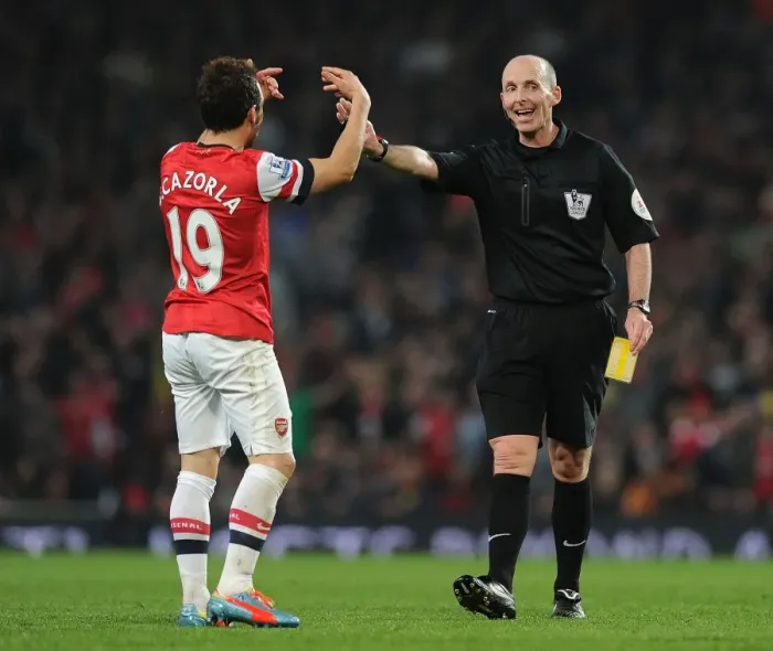 Framed Print : Santi Cazorla and Referee Mike Dean Clash in Arsenal vs Manchester City Premier League Match, 2013 / 14 Framed Print : Santi Cazorla and Referee Mike Dean Clash in Arsenal vs Manchester City Premier League Match, 2013 / 14