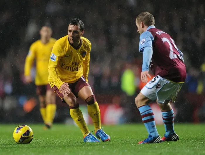 Framed Print : Santi Cazorla vs. Barry Bannan: Clash of Midfielders in Aston Villa vs. Arsenal (2012-13)