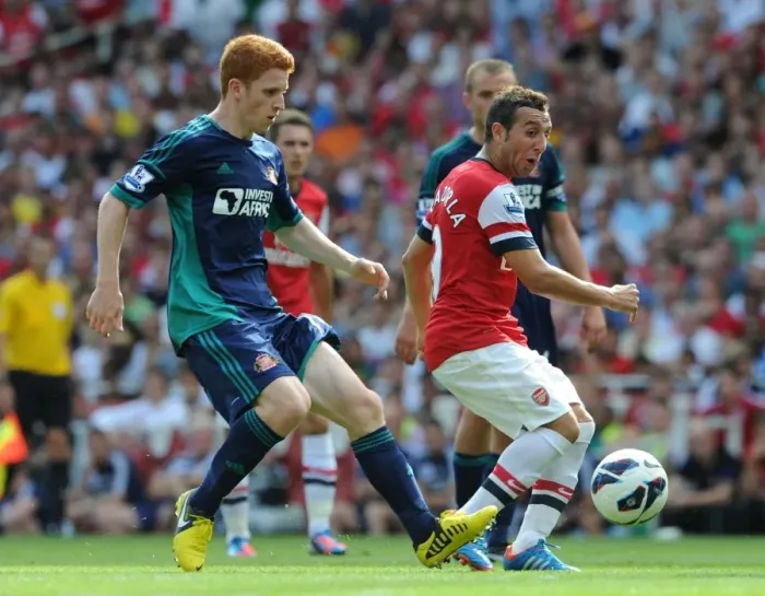 Framed Print : Santi Cazorla vs Jack Colback: Intense Battle in Arsenal v Sunderland Premier League Clash Framed Print : Santi Cazorla vs Jack Colback: Intense Battle in Arsenal v Sunderland Premier League Clash