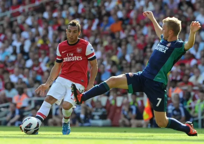 Framed Print : Santi Cazorla vs Seb Larsson: Intense Battle for Ball Possession at Arsenal vs Sunderland (2012-13) Framed Print : Santi Cazorla vs Seb Larsson: Intense Battle for Ball Possession at Arsenal vs Sunderland (2012-13)