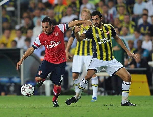 Santi Cazorla's Agile Moves: Outmaneuvering Fenerbahce's Bekir Irtgun in Arsenal's Champions League Showdown (2013)