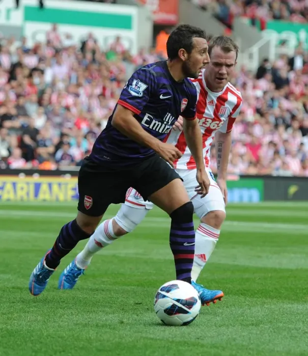 Framed Print : Santi Cazorla's Agile Outmaneuver of Glenn Whelan: A Iconic Moment from Arsenal's Victory over Stoke City (2012-13)