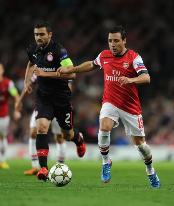 Framed Print : Santi Cazorla's Masterclass: Outsmarting Giannis Maniatis in Arsenal's UEFA Champions League Victory, 2012