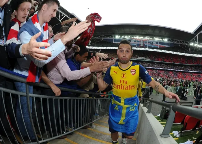 Framed Print : Santi Cazorla's Triumphant FA Cup Celebration: Arsenal's Victory over Aston Villa